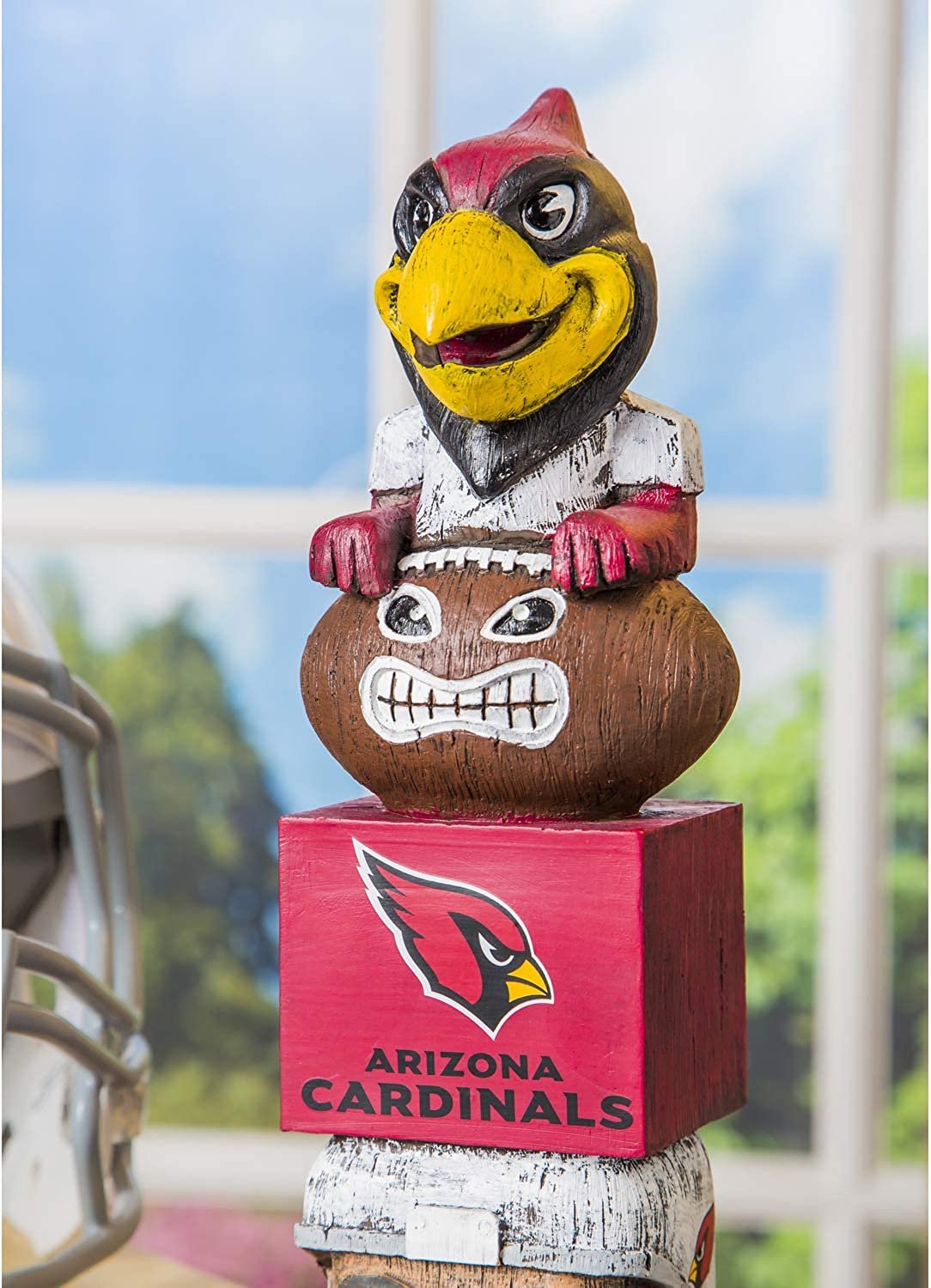 Arizona Cardinals-themed decorative item with mascot on a stand