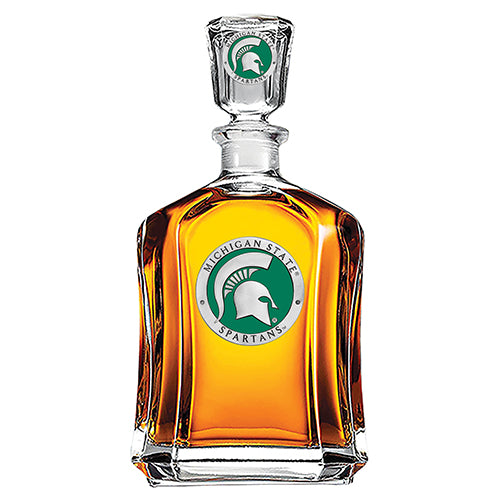 Glass decanter with Michigan State Spartans logo on a white background