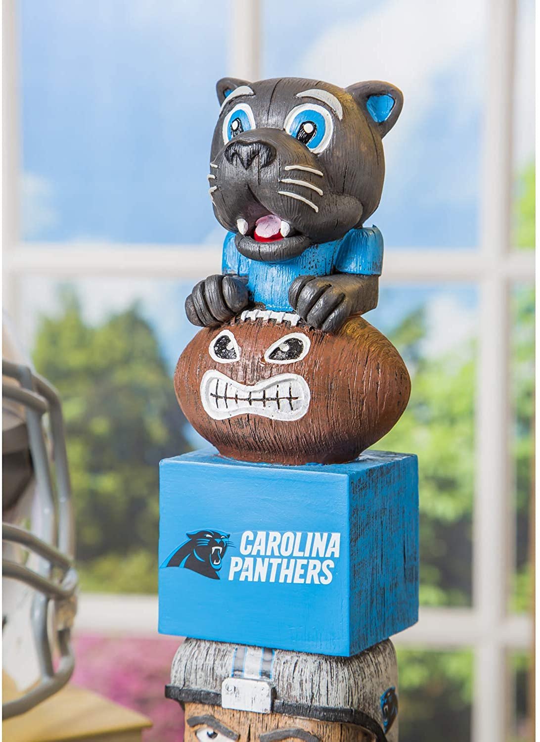 Carolina Panthers-themed bobblehead figure on a blue base with a football design.