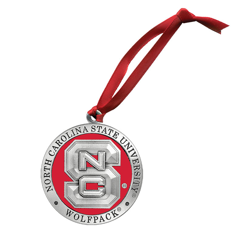 Medal with NC State Wolfpack logo on a red ribbon against a white background