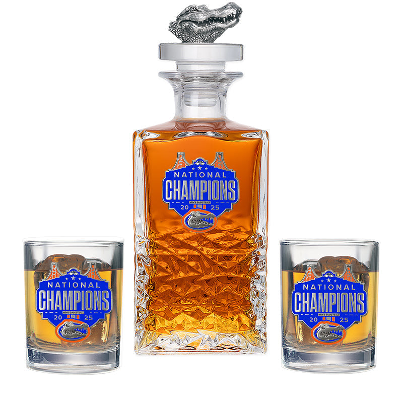 Decanter and two glasses with 'National Champions' label on a white background