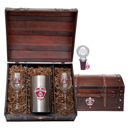 Wine glass and tumbler set with a wooden chest and bottle stopper on a white background