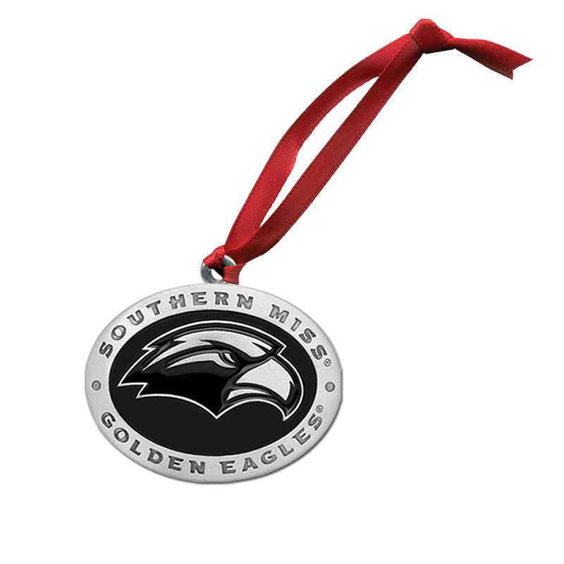 Metallic ornament with 'Southern Miss Golden Eagles' logo and red ribbon on a white background