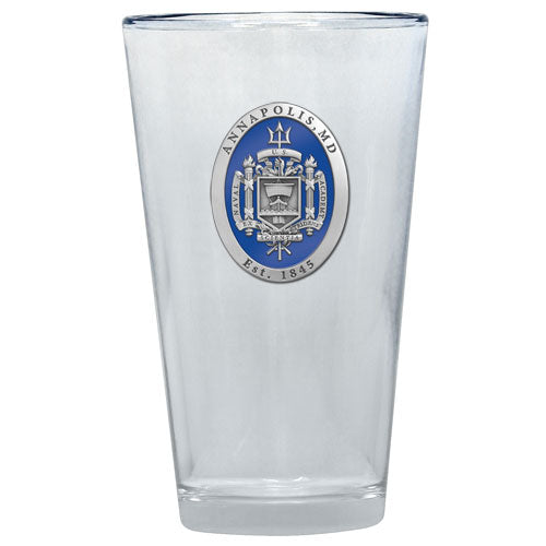 United States Naval Academy Crest Pint Glass Clear glass with a blue and silver emblem on a white background