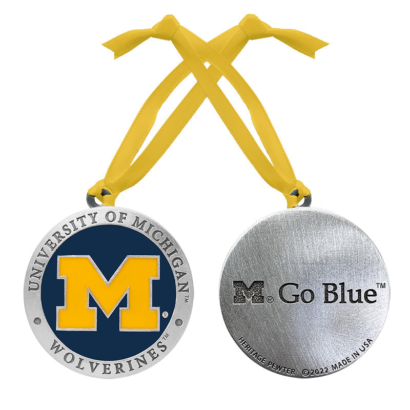 Medal with University of Michigan Wolverines logo and 'Go Blue' text on a yellow ribbon.