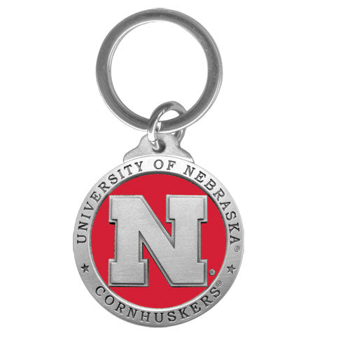 Keychain with 'University of Nebraska Cornhuskers' logo on a red and silver background