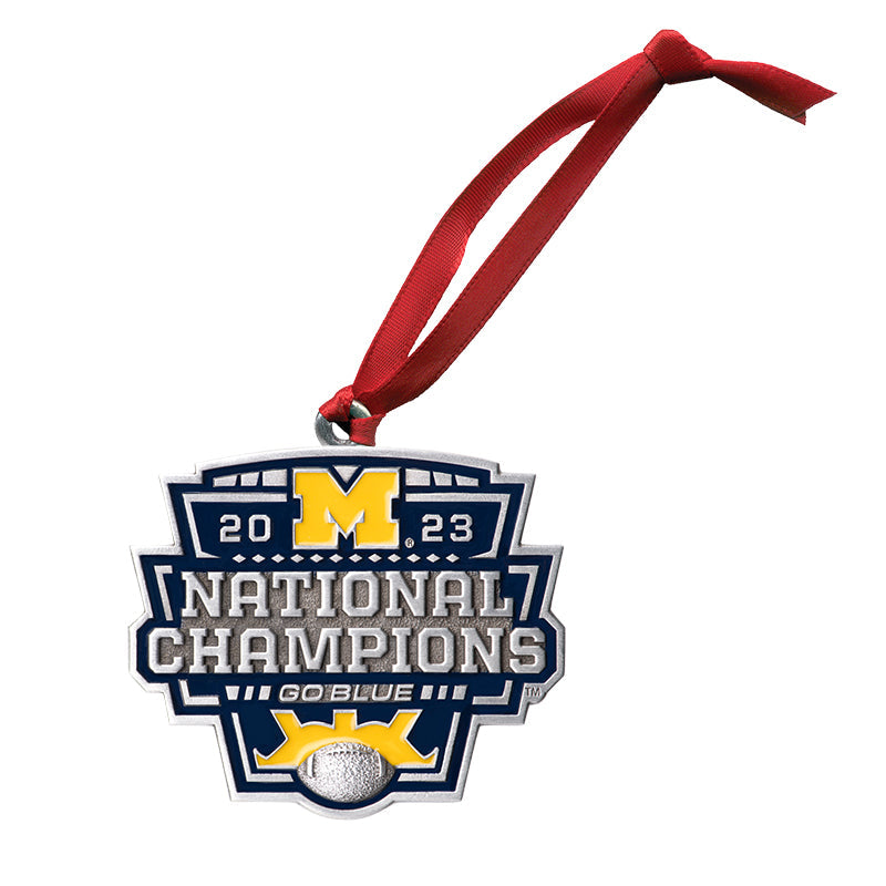 Decorative ornament celebrating Michigan's 2023 national championship with a red ribbon.