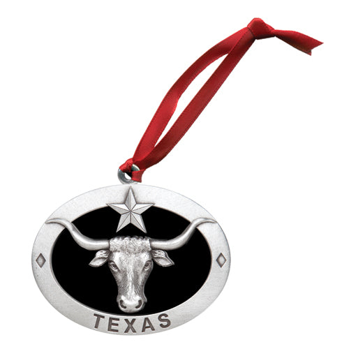 Decorative ornament with a longhorn bull and star design on a black background, featuring the word 'Texas', with a red ribbon.