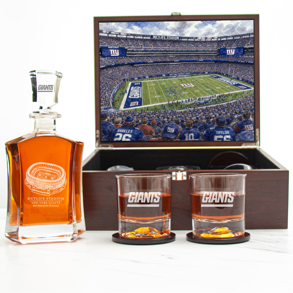 New York Giants decanter set with stadium rendering displayed in an open luxury wood box