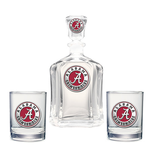 Decanter and two glasses with Alabama Crimson Tide logo on a white background