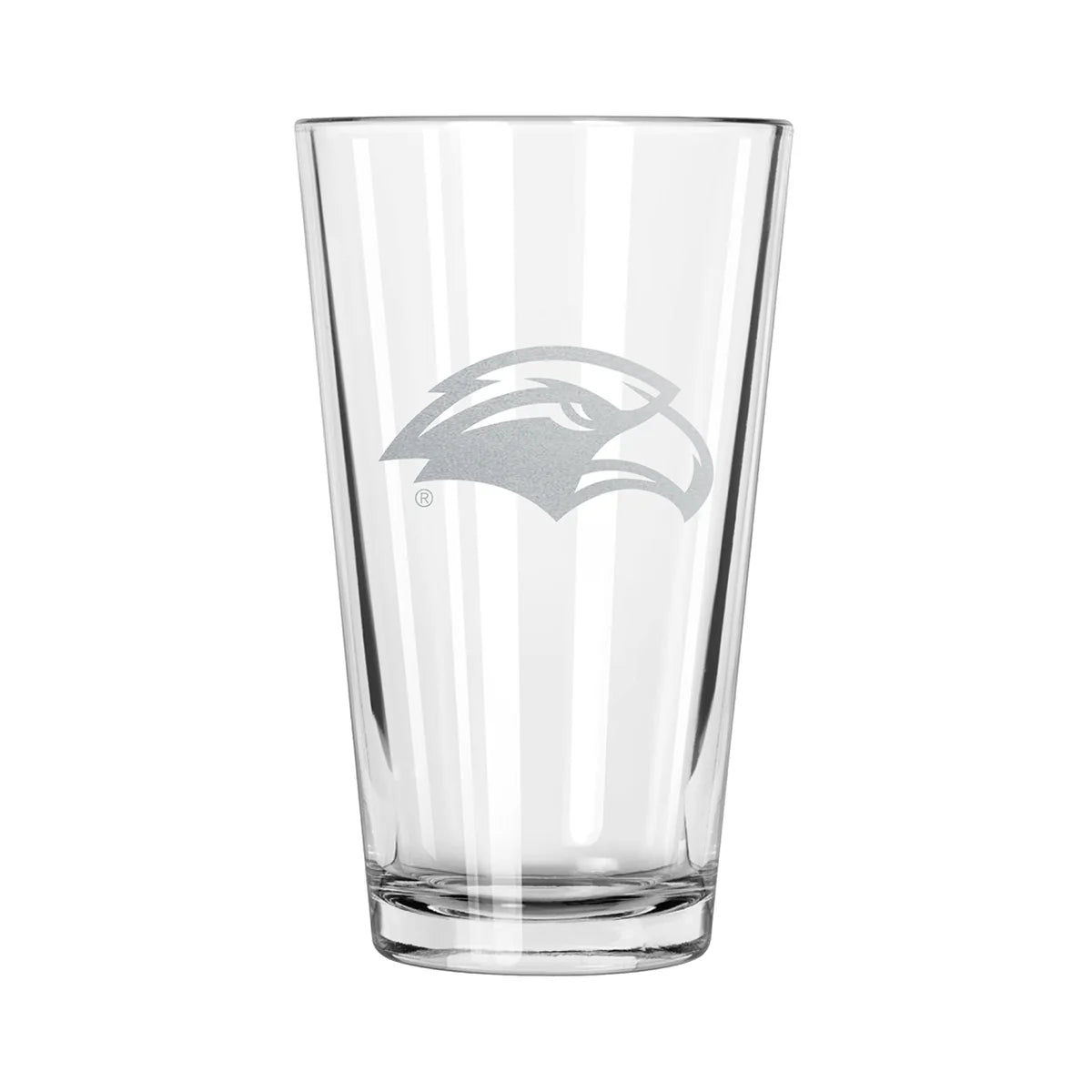 A clear pint glass with an etched design of the Southern Mississippi Golden Eagles logo.