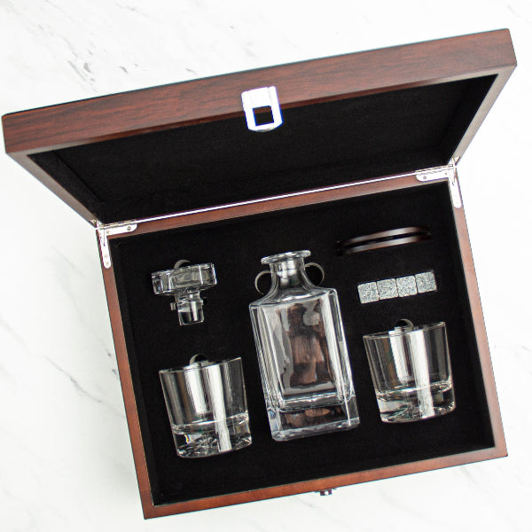 decanter set with glasses and accessories in a wooden box
