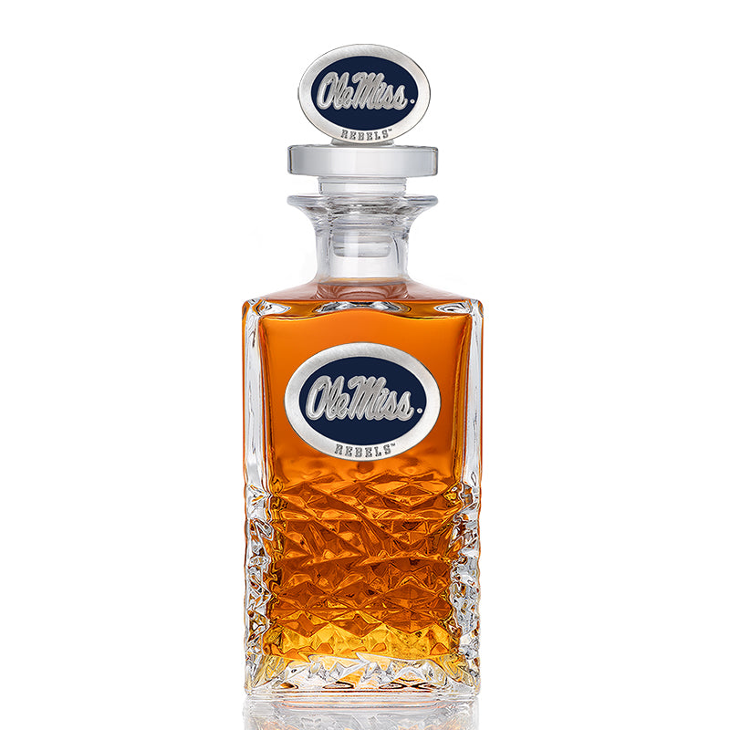 Glass whiskey decanter with Old-Line label on a white background