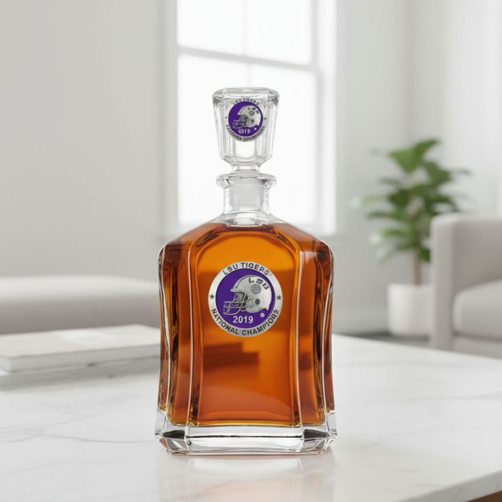 Glass decanter with LSU Tigers 2019 national champions emblem on a white background
