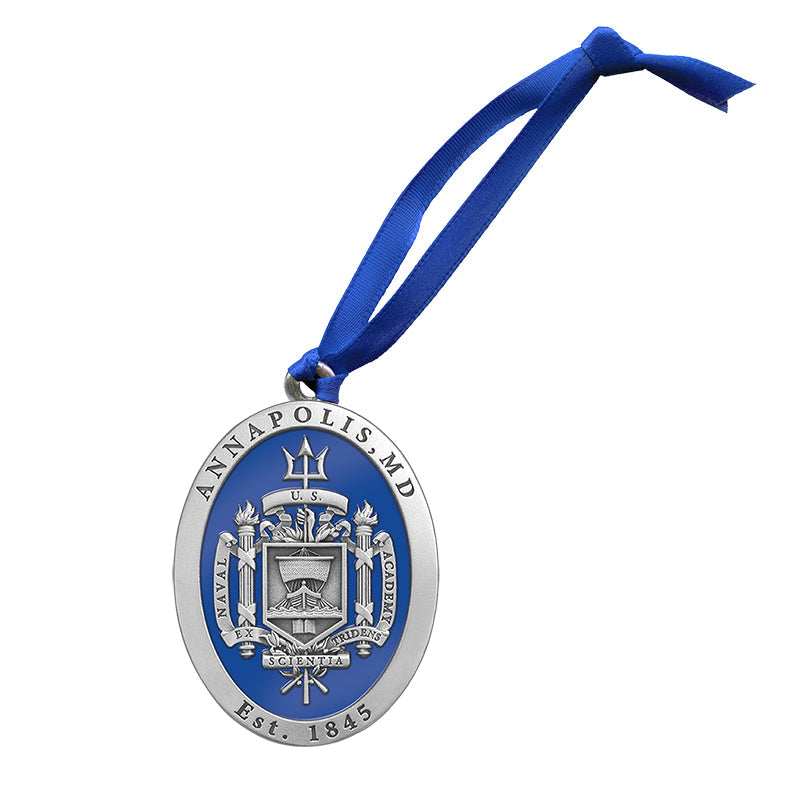 Decorative ornament with a blue ribbon and emblem on a white background