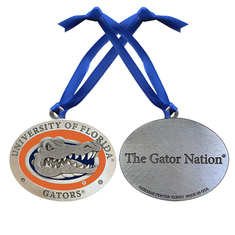 Medal with University of Florida Gators logo and 'The Gator Nation' text on a blue ribbon.