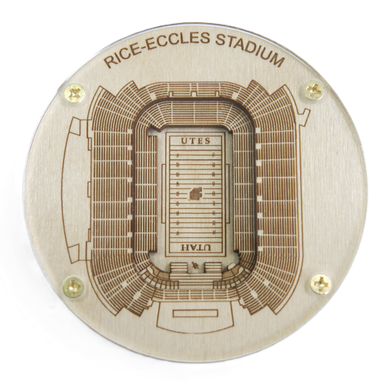 Circular wooden model of Rice-Eccles Stadium with 'UTES' branding on a white background