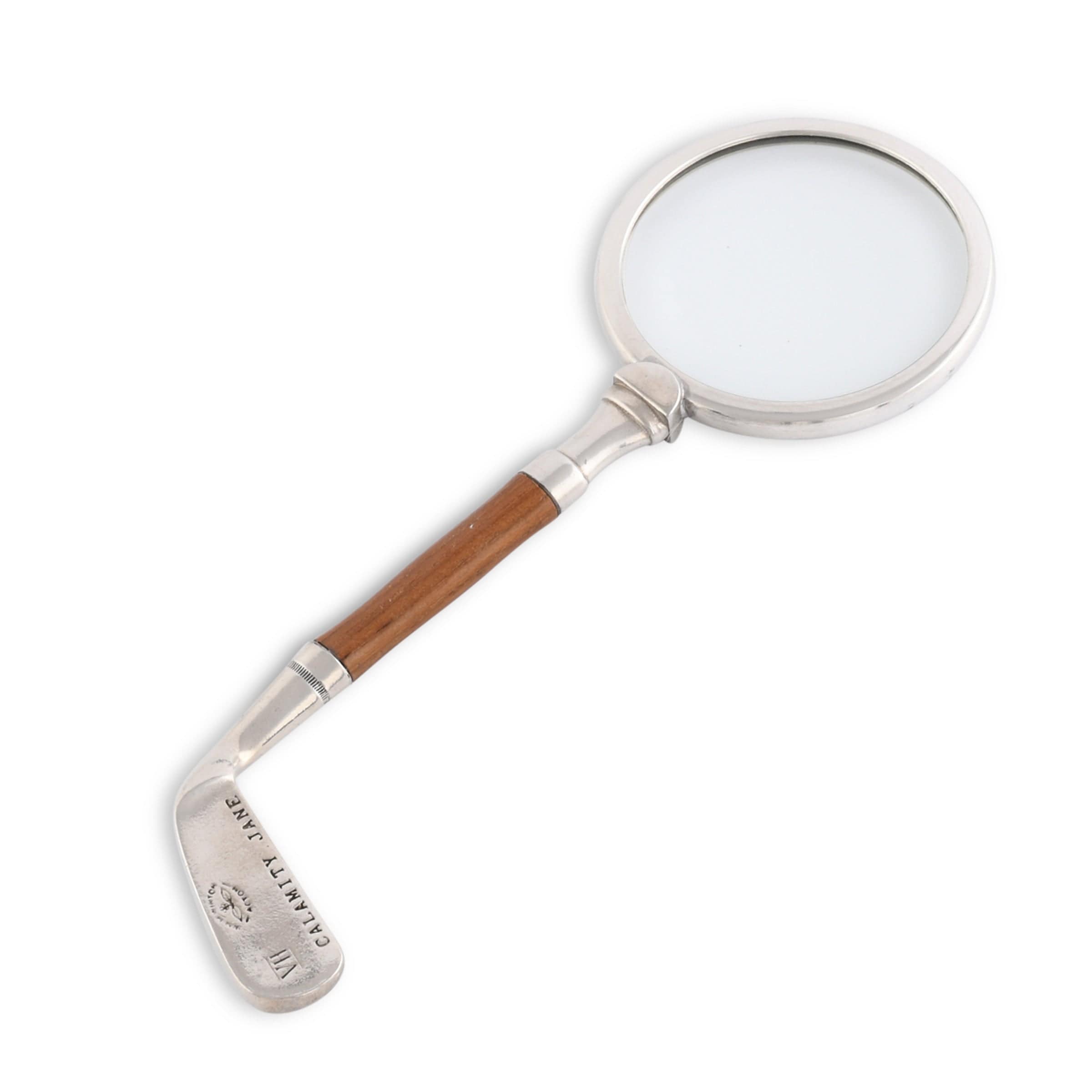 Magnifying glass with wooden handle and silver metal on a white background